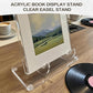 Clear acrylic book display easel stand with angled frame and curved supports