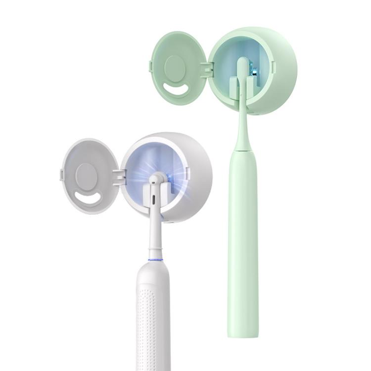 Mint toothbrush with charging dock and two UV storage cases, lids open