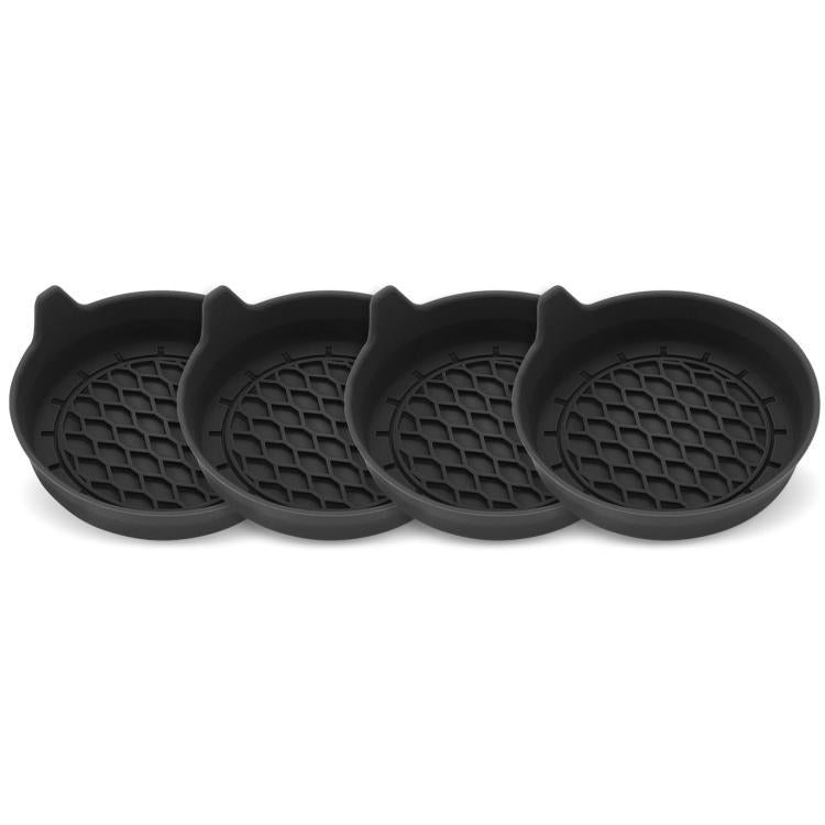 Black silicone car coaster set of 4 shown in cup holders with textured grips