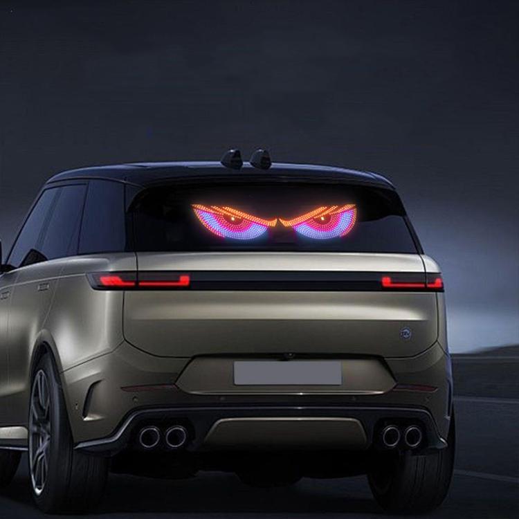 Rear car windshield LED eye sticker lights glowing in purple and blue