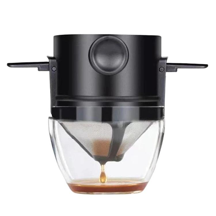 Black coffee filter cup with mesh cone dispensing into a glass cup