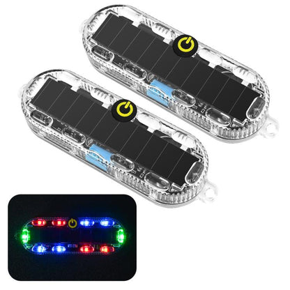 Pair of solar LED motorcycle tail lights with clear oval housings and blue light bars