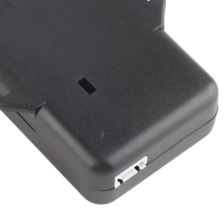 Black plastic housing with white connector slot at one end