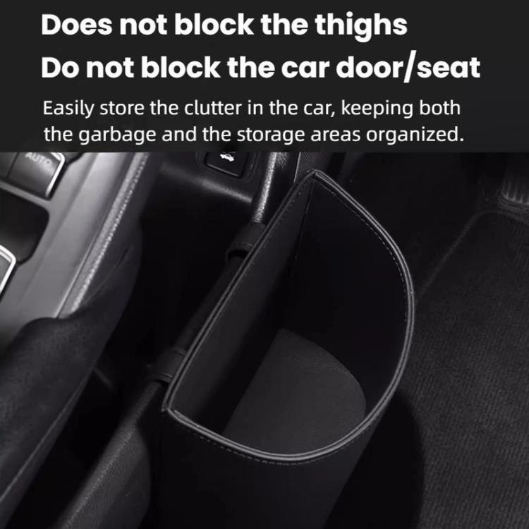 Black hanging car trash can storage box beside the seat