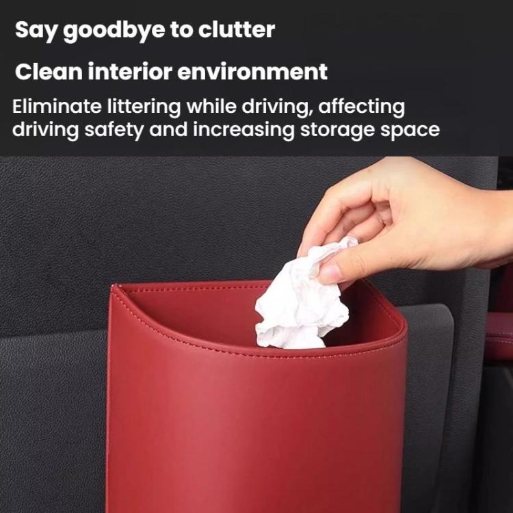 Red hanging leather car trash can with top open for waste disposal