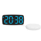 White LED alarm clock with blue light time display and round vibration base.