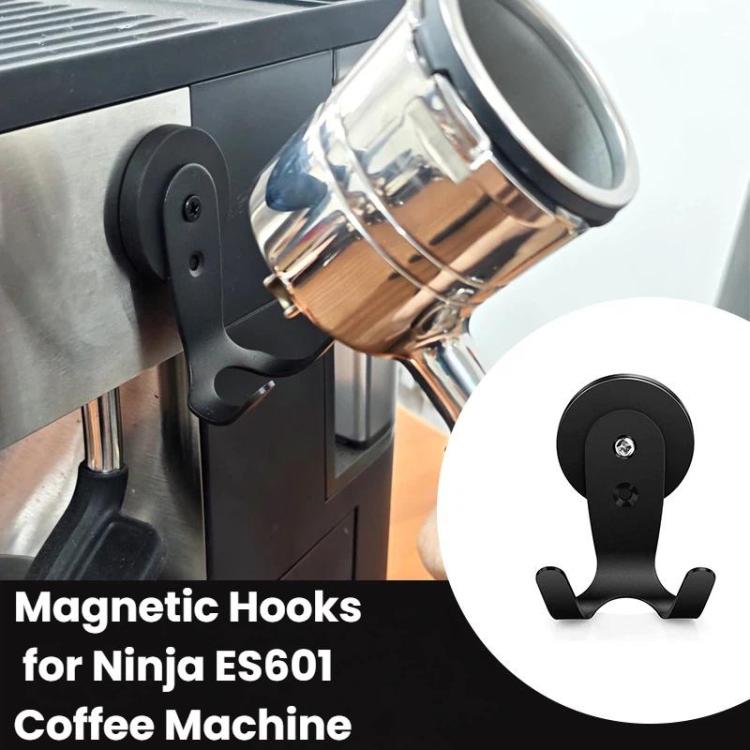 Black magnetic hook mounted on coffee machine side for hanging accessories