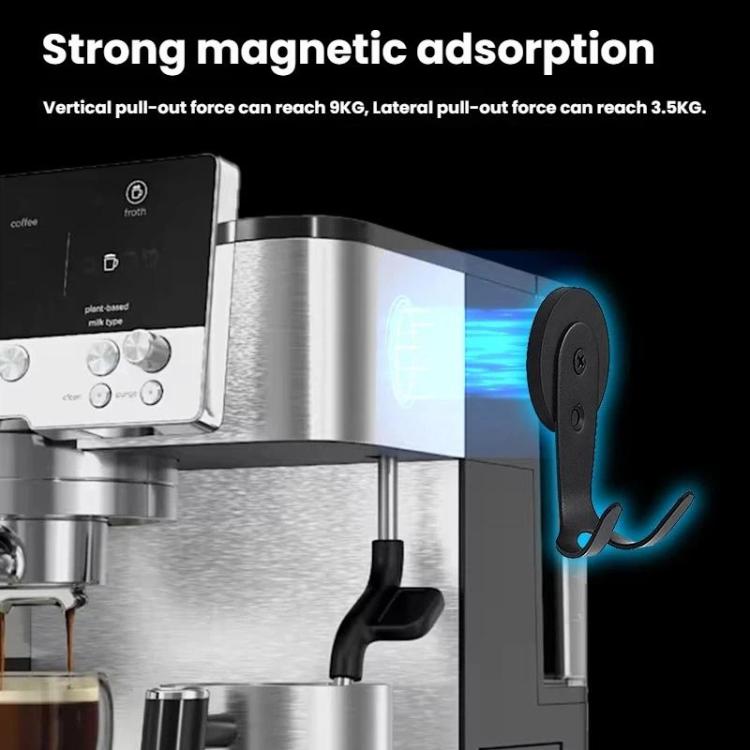Black magnetic adsorption hook attached to a stainless steel coffee machine