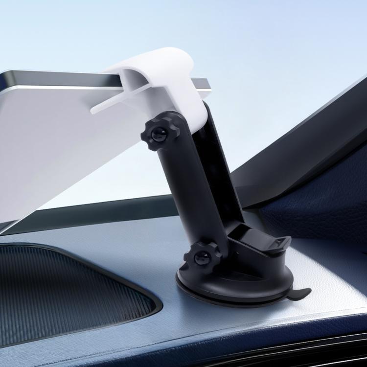 Car dashboard device mount close-up with white top and black suction base on dashboard