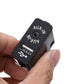Black AUX-IN switch with USB icon and 3.5mm audio jack, held in hand