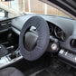 Steering wheel cover installed on car steering wheel, dark cloth
