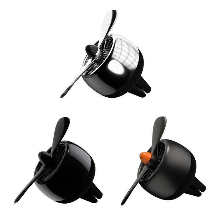 Car air vent air freshener ornament shown in multiple angles, with orange accent
