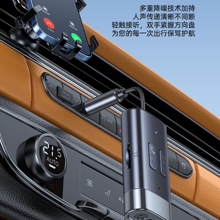 Bluetooth car AUX adapter close-up with illuminated controls along the car console