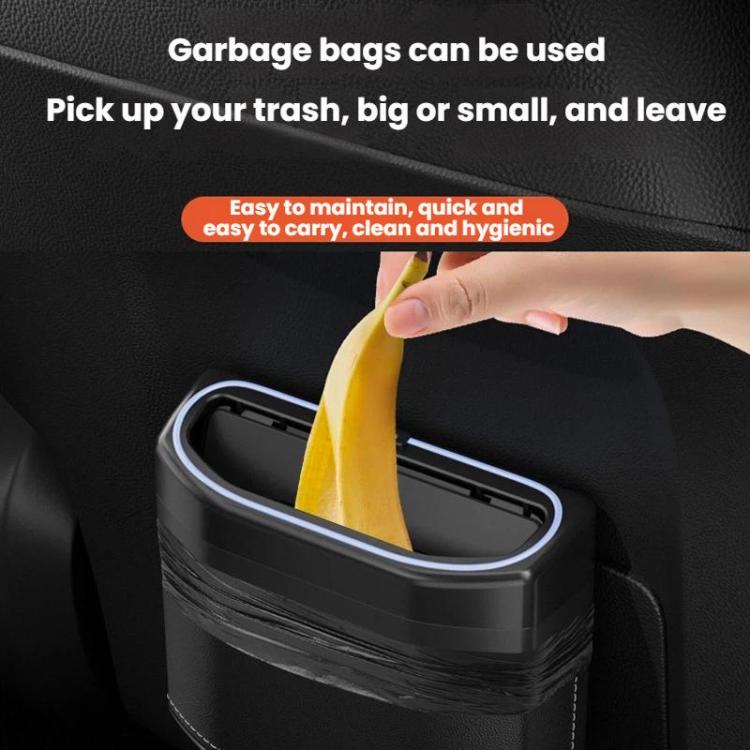 Black car trash can storage box holding a yellow garbage bag under the hinged lid