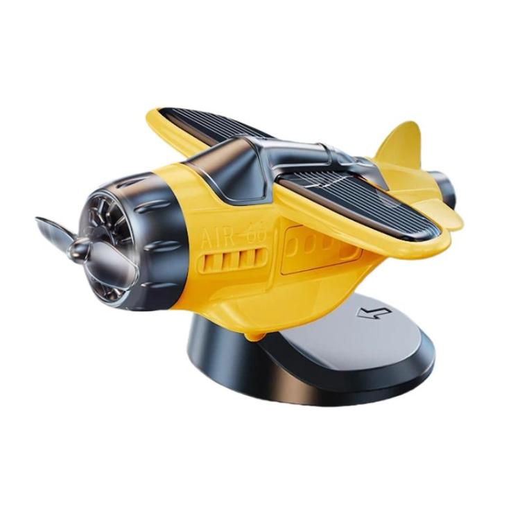Yellow and black solar-powered airplane dashboard ornament with rotating base