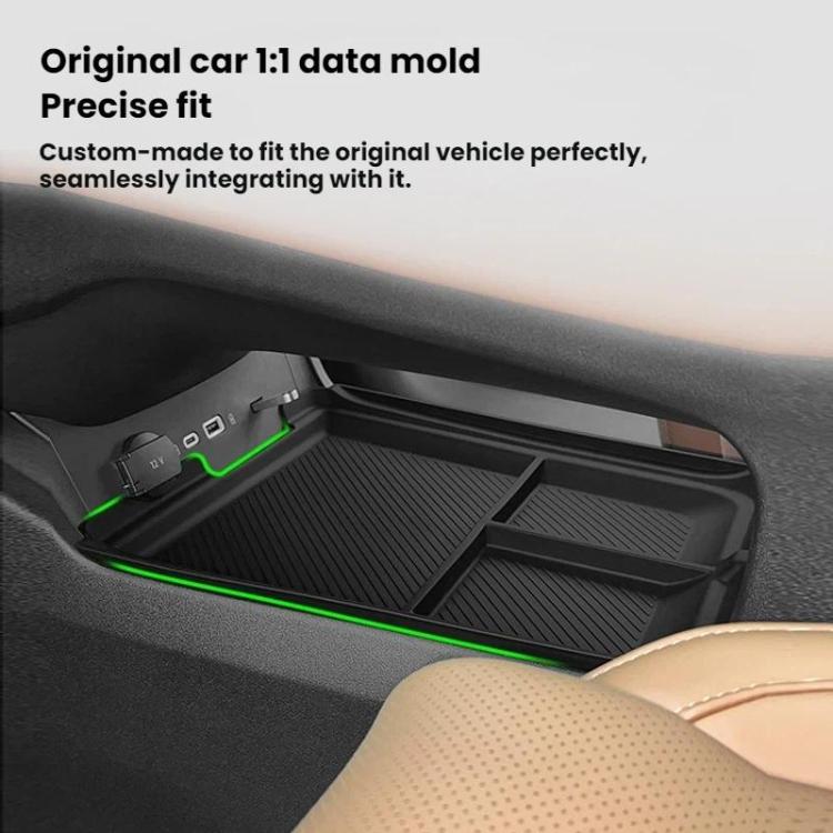 Black center console storage box installed with divided tray surfaces under armrest.