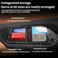 Black center console storage tray insert with multiple compartments for small items.