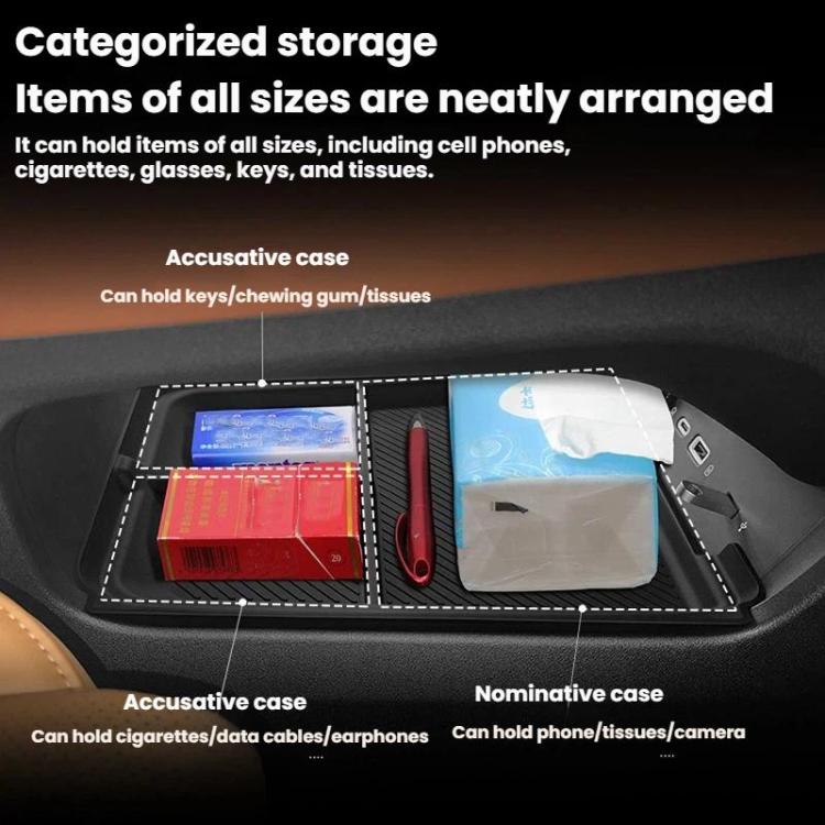 Black center console storage tray insert with multiple compartments for small items.