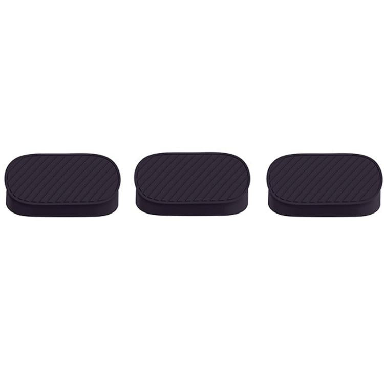 Purple silicone hole plug for passenger-side opening, oval with ribbed top texture
