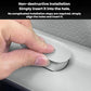 Gray oval silicone hole plug being inserted into an opening by hand