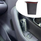 Car door armrest storage box installed, holding small items near center console