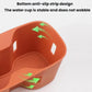 Orange silicone water bottle pad insert with textured base and anti-slip bottom strip