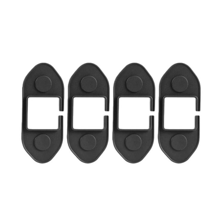 Set of four black silicone door limiter covers with curved top and bottom pads, square cutout.