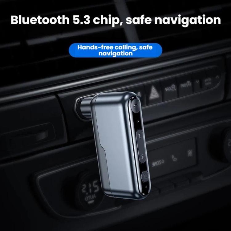 Black Bluetooth audio adapter clipped near car dashboard controls