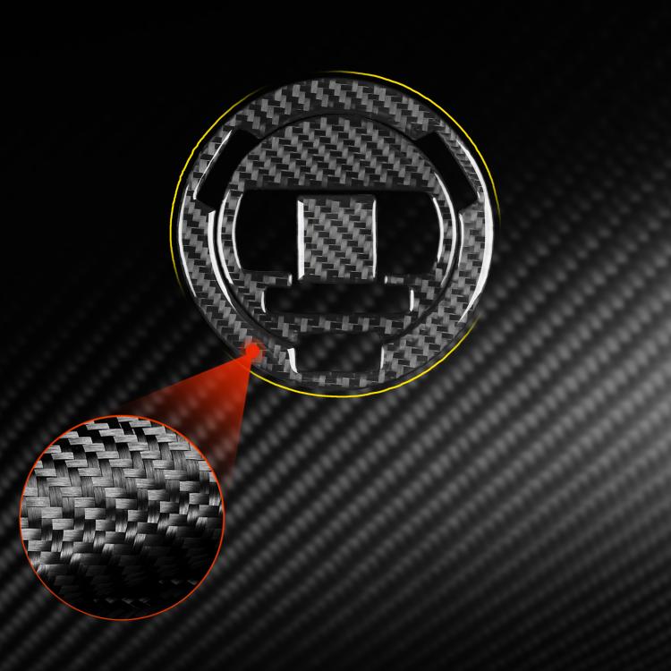 Round fuel tank cap sticker with black carbon-fiber weave and metal border