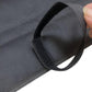 Close-up of foldable car bumper mat fabric with attached carrying tie