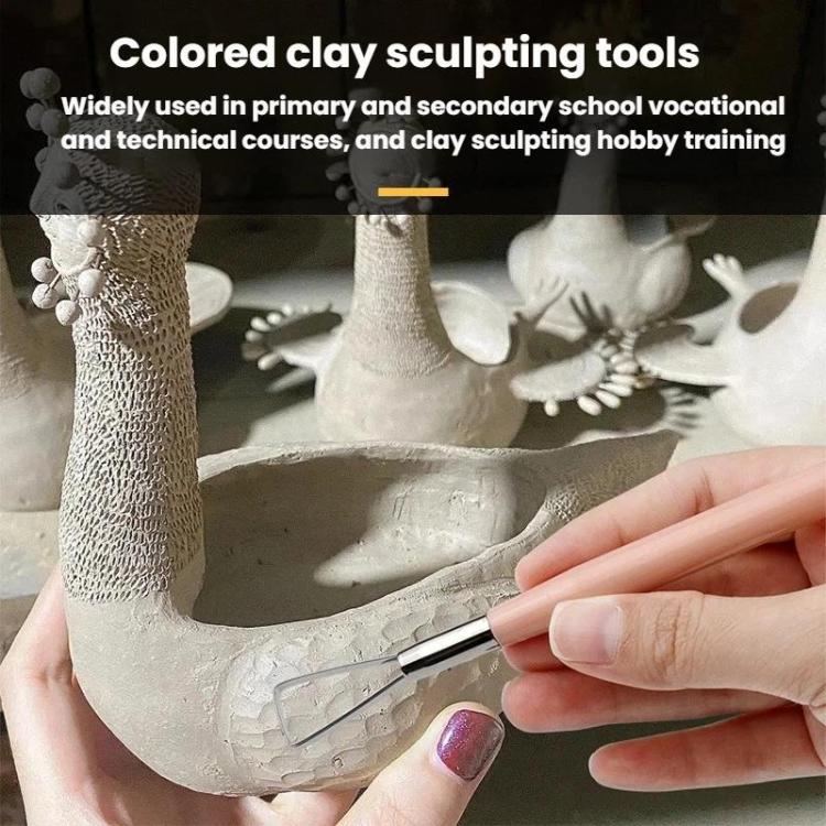 Hand using a clay sculpting tool with metal loop tip and peach handle on clay