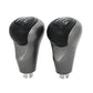 Set of manual gear shift knobs, black tops and silver bases, gear markings