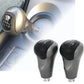 Manual gear shift knobs installed, black tops and silver bodies with gear labels