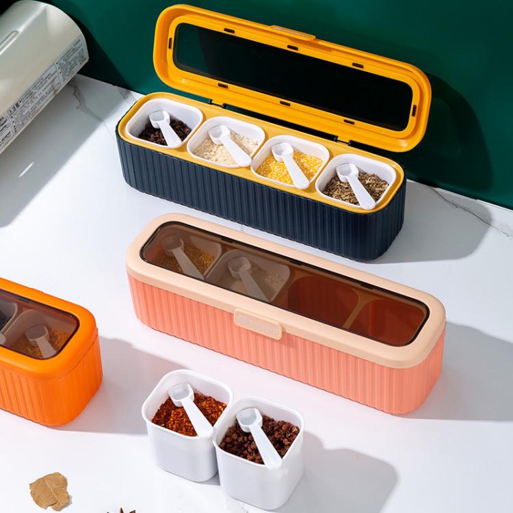Two-tone seasoning storage box with orange lid and white 4-compartment spice trays