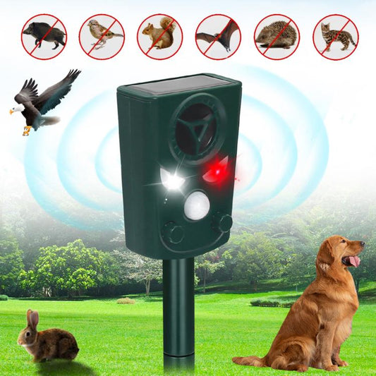 Outdoor solar ultrasonic animal repellent device on stake, dark green with LED light