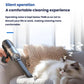 Handheld cordless vacuum cleaner cleaning a sofa cushion with its nozzle