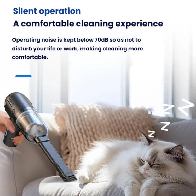 Handheld cordless vacuum cleaner cleaning a sofa cushion with its nozzle