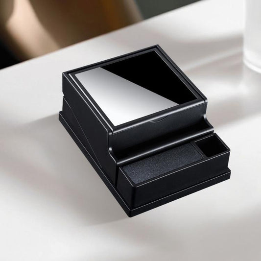 Black automatic cigarette case with open lid and lighter holder slot