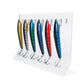 Clear acrylic 10-hole lure stand holding colorful fishing lures with front hooks