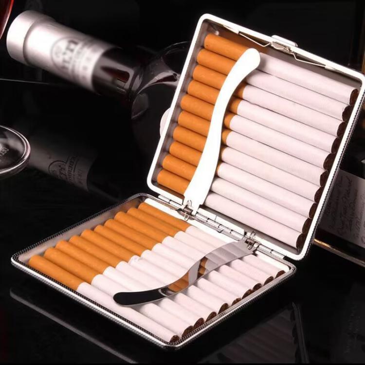 Open cigarette case with stacked cigarettes and metal spring holders.