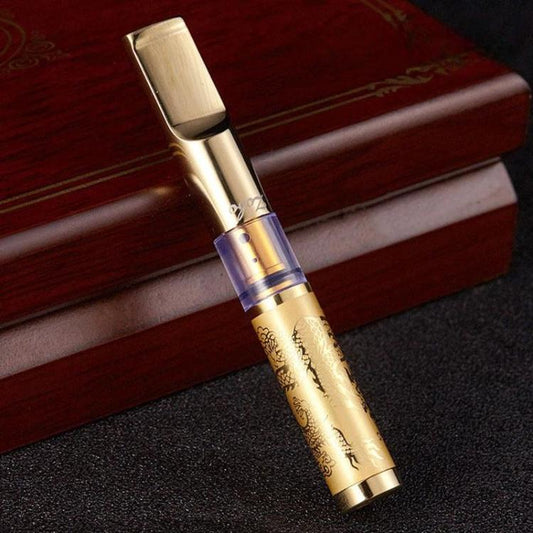 Gold reusable cigarette filter tip with blue collar on a wooden case