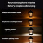 Black portable camping lantern warmly lit with multiple glowing filament strands