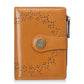 Women’s short wallet in brown oil-waxed leather with perforated pattern and zipper