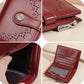 Red oil-waxed leather short wallet with perforated pattern, snap logo, zipper coin pocket