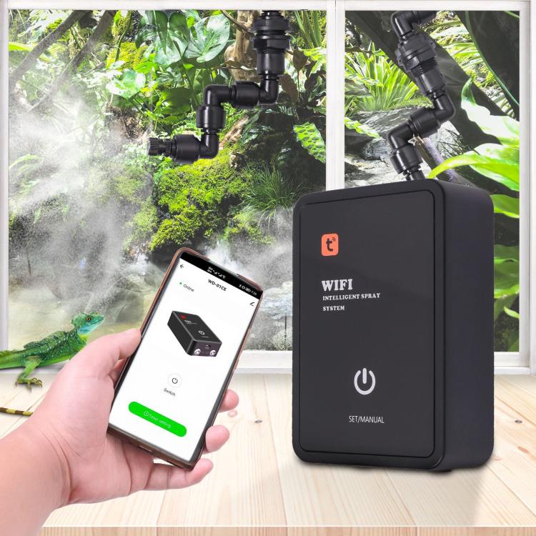 Black WiFi misting system controller next to smartphone showing app screen