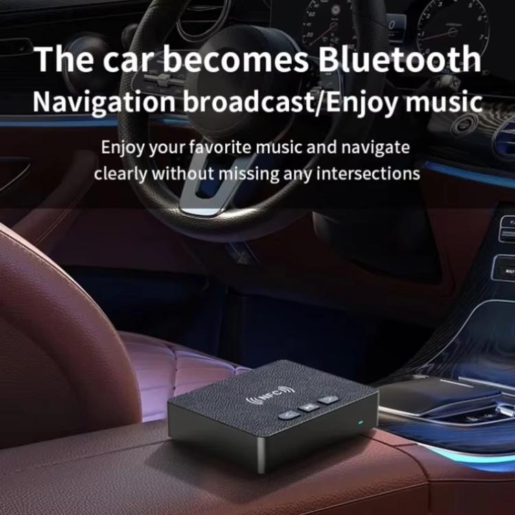 Bluetooth audio receiver placed on a car dashboard with button panel