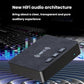 Black Bluetooth audio receiver with NFC icon, three top buttons, and blue LED