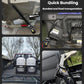 Black retractable tie-down strap tensioner attached to vehicle cargo with two hooks
