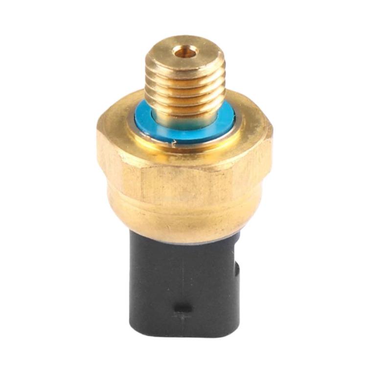 Oil pressure sensor with brass threaded tip, blue seal, and black electrical connector.