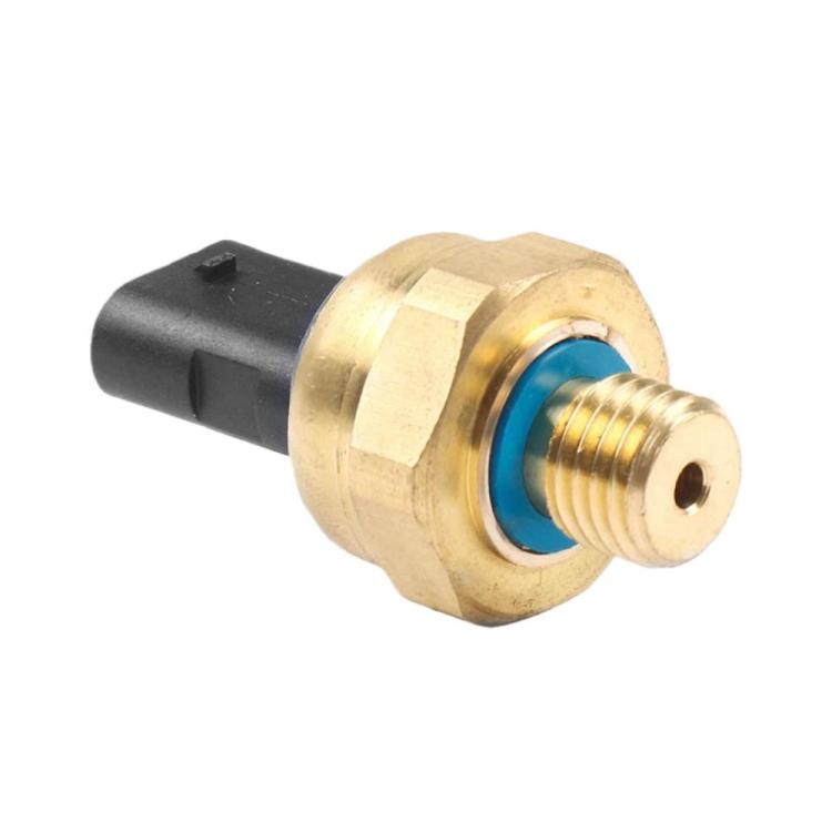 Oil pressure sensor with brass housing, blue ring seal, and black connector plug.